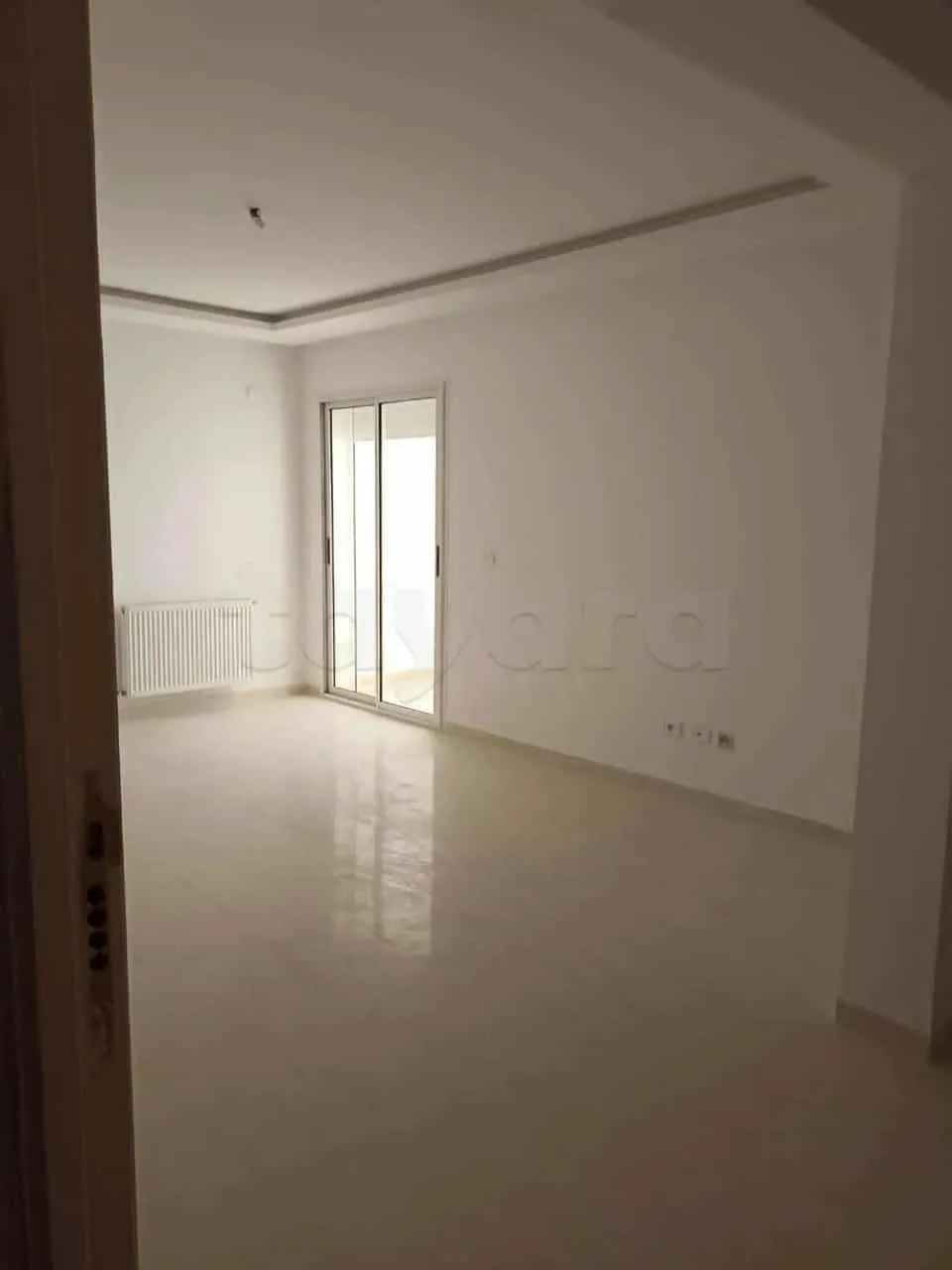 un appartement s+2 haut standing au 5éme étage(avec ascenseur) a louer a cité enkhilette