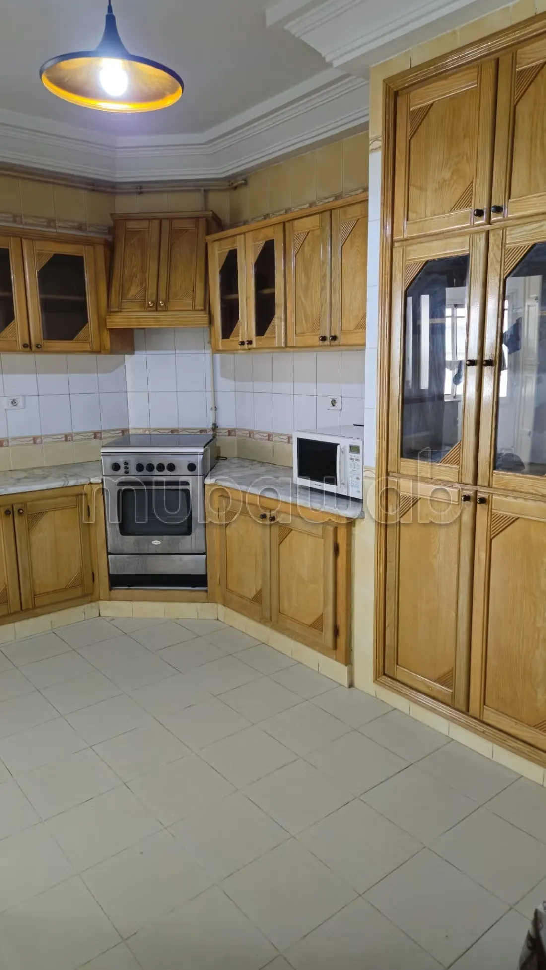 'un appartement 1ére étage S+3 meublé situé à Cité Ennaser 1