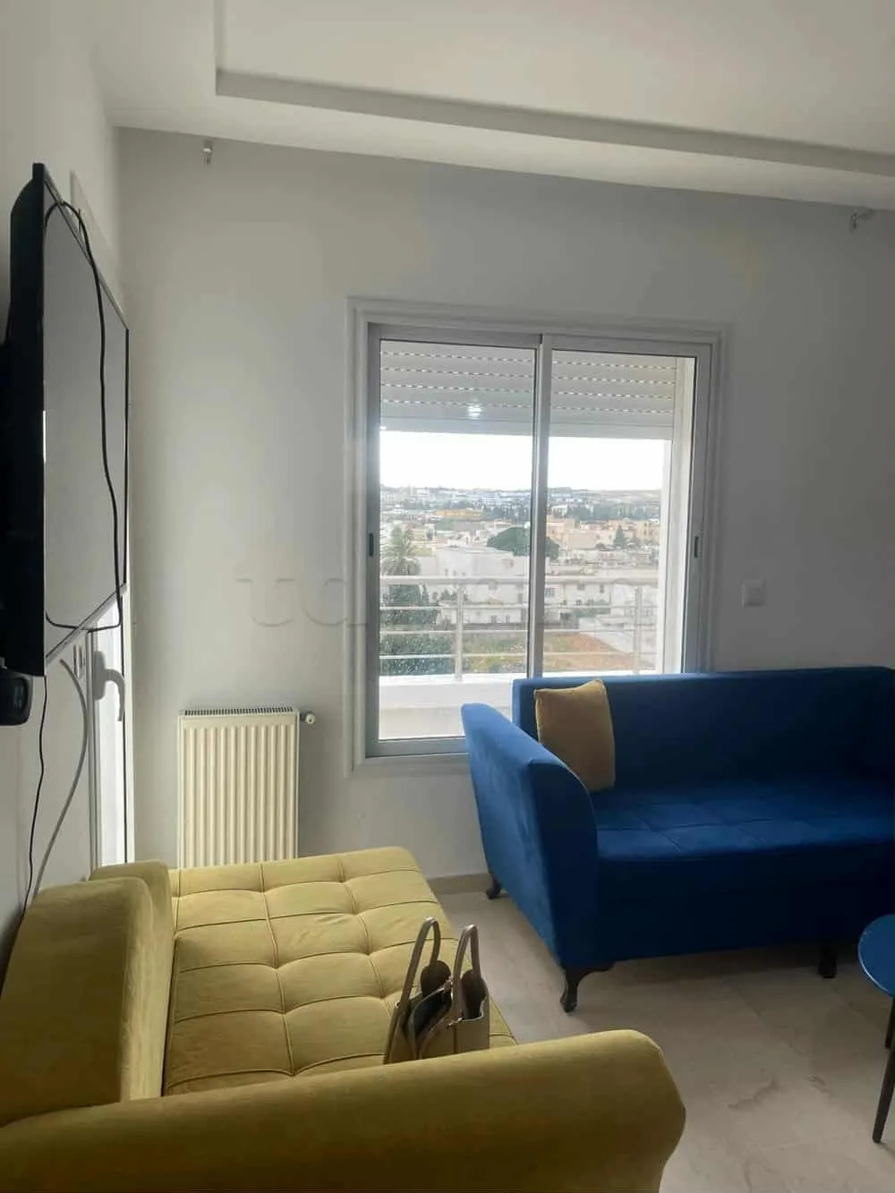 un appartements s+2 au 6 éme étage(avec ascenseur)a louer a Manouba Centre Prés de Terrain Masmoudi.
