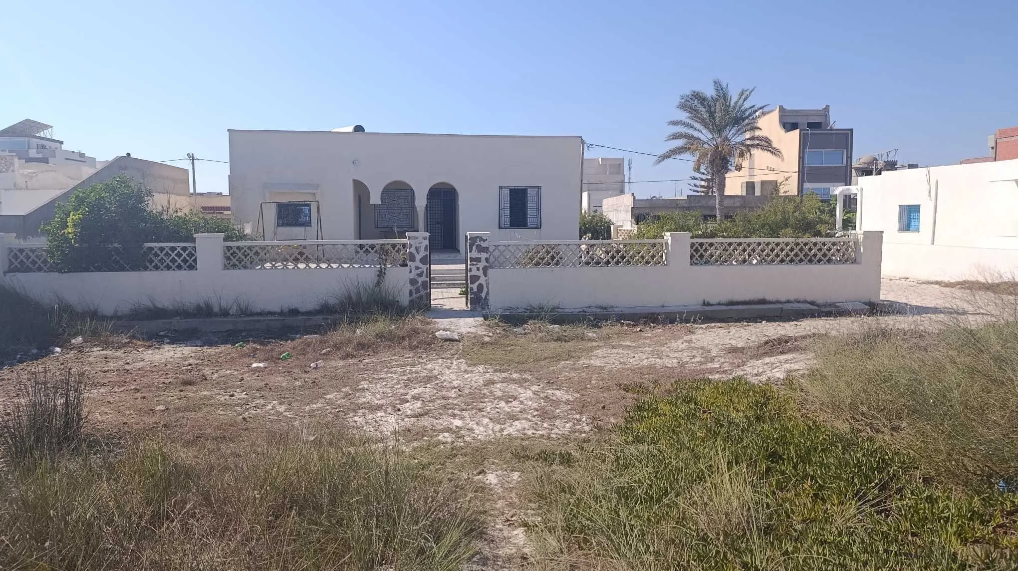 Une maison Pieds dans l'eau - Plage sablonneuse