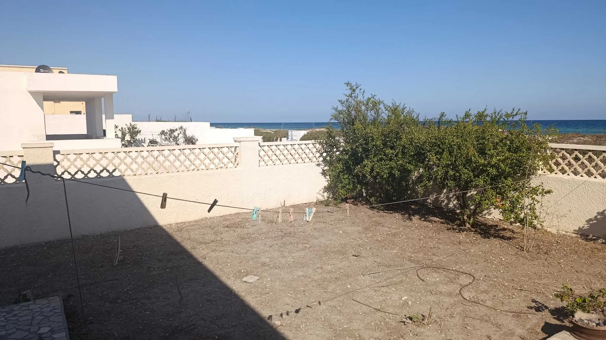 Une maison Pieds dans l'eau - Plage sablonneuse