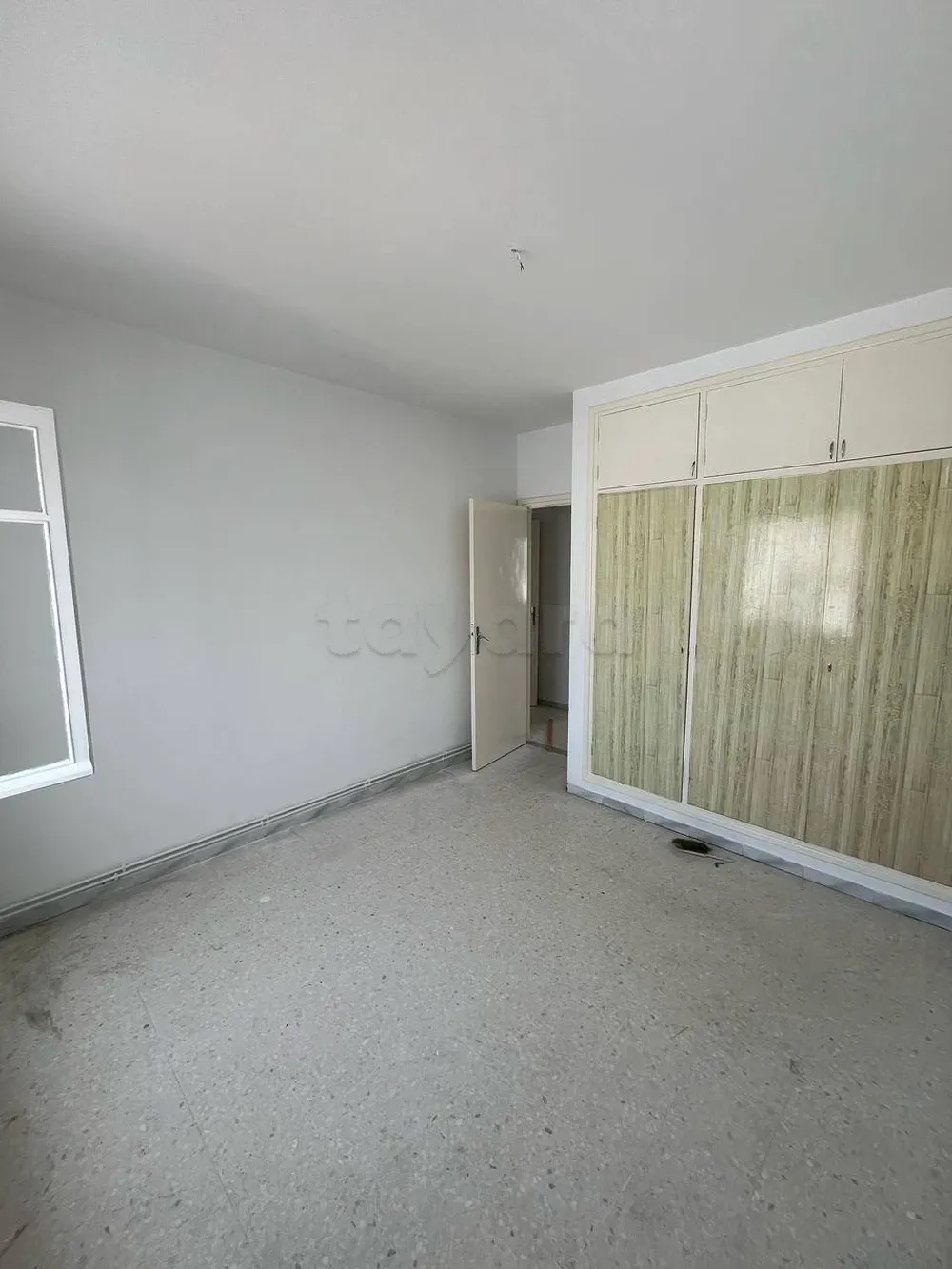 un appartement S+3 situé cité ENNASR 1