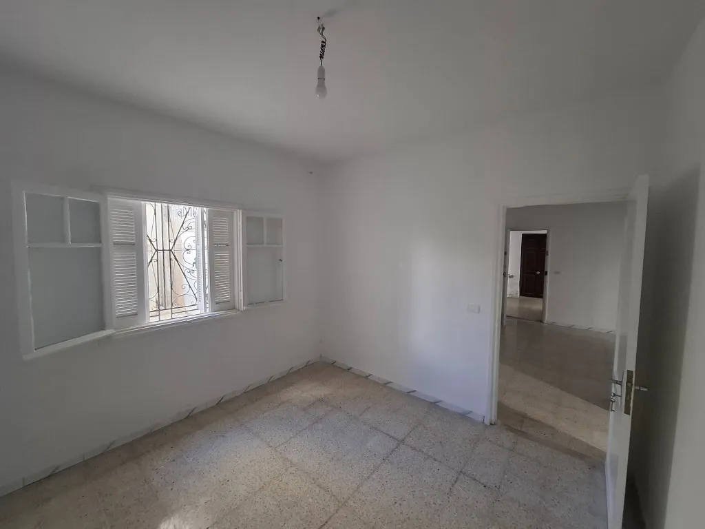 À Vendre – Appartement S+2 Rez-de-Chaussée avec Place de Parking à Mourouj 5