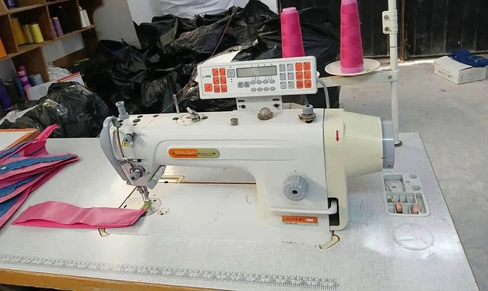 MACHINE A COUDRE SURIBA COUPE FIL LEVE PIED