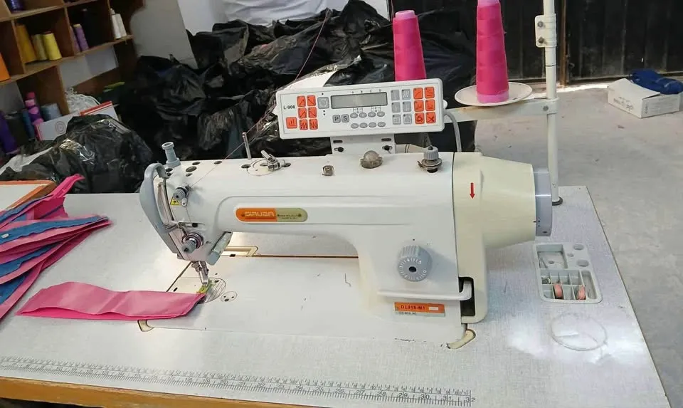 MACHINE A COUDRE SURIBA COUPE FIL LEVE PIED