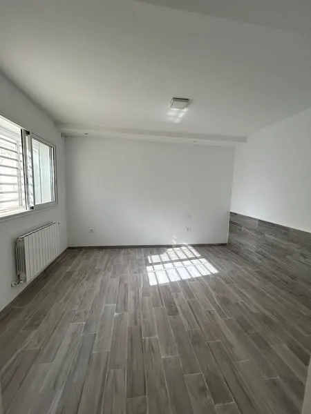 'un appartement au RDC S+1 avec jardin situé Jardin d'el Menzah 2