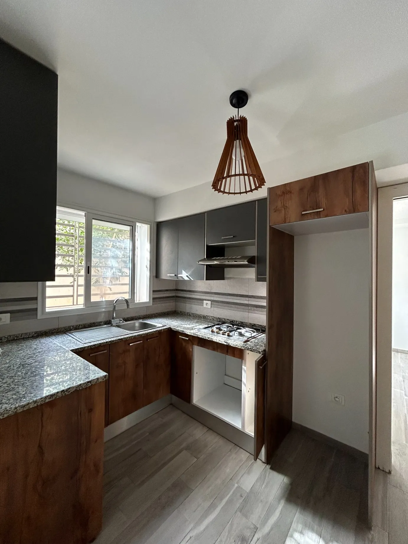 'un appartement au RDC S+1 avec jardin situé Jardin d'el Menzah 2
