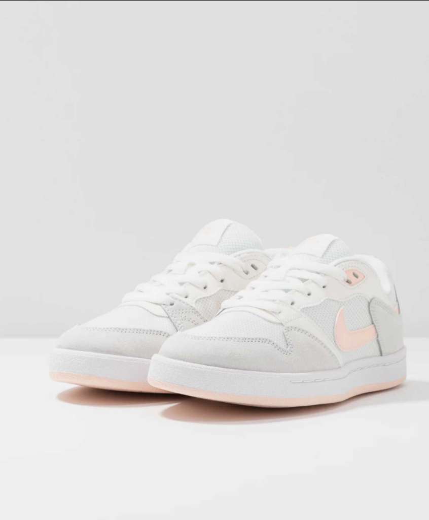 Sneaker Nike tout neuf importé blanc / rose 