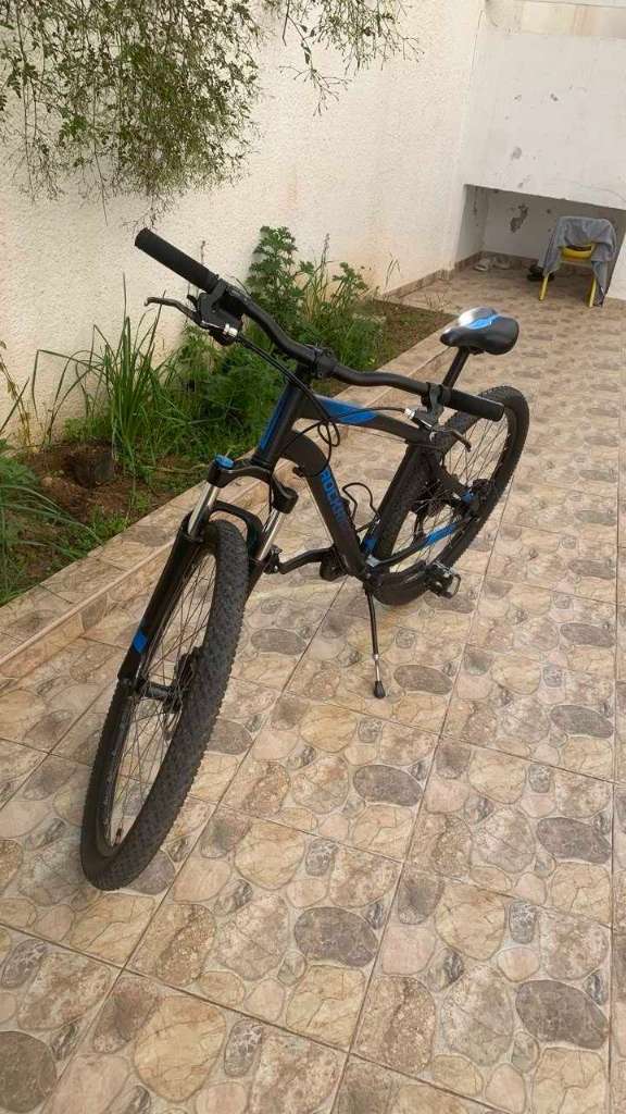 ROCKRIDER

Vélo vtt randonnee st 120 noir bleu 27,5"