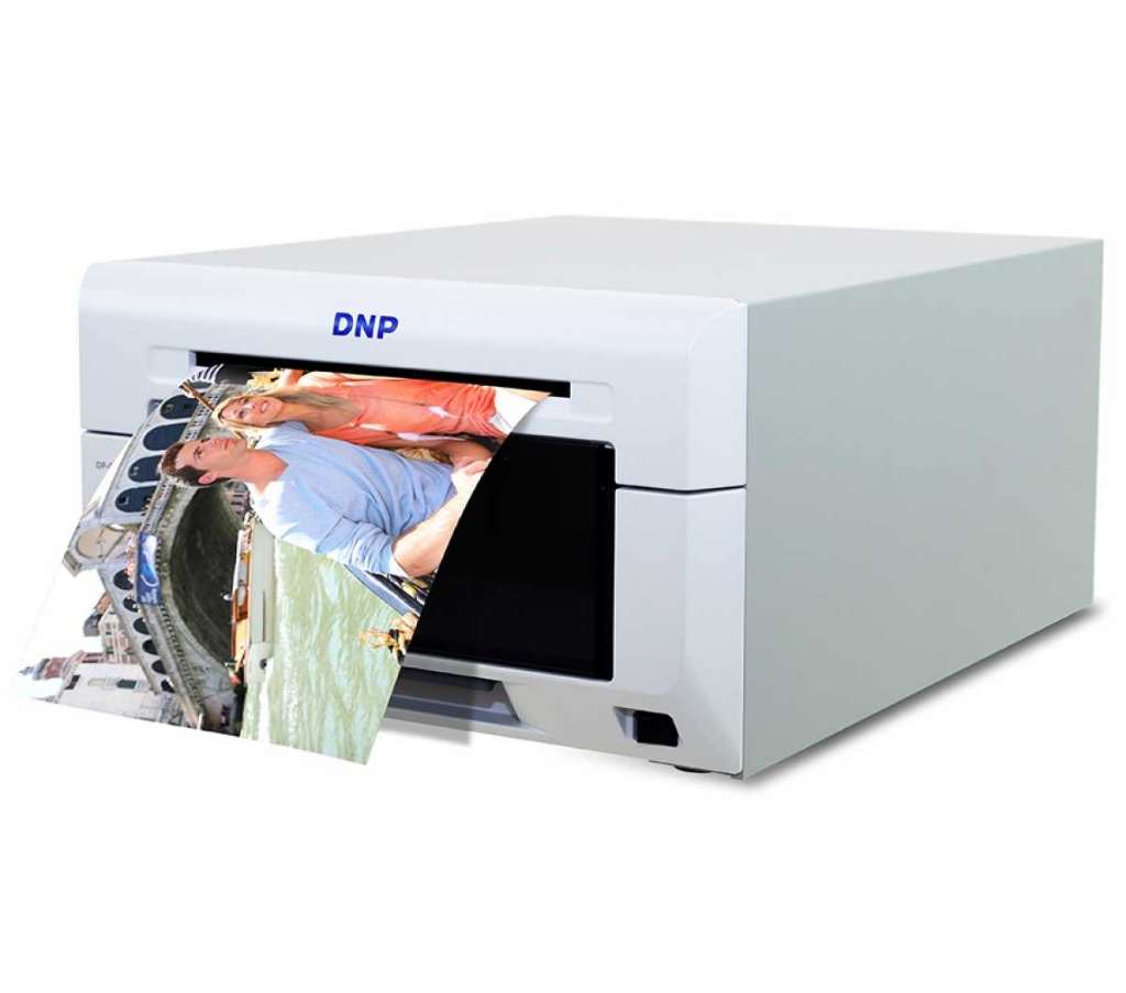 imprimante dnp ds 620 en très bon état , avec consommable , tél 98508252