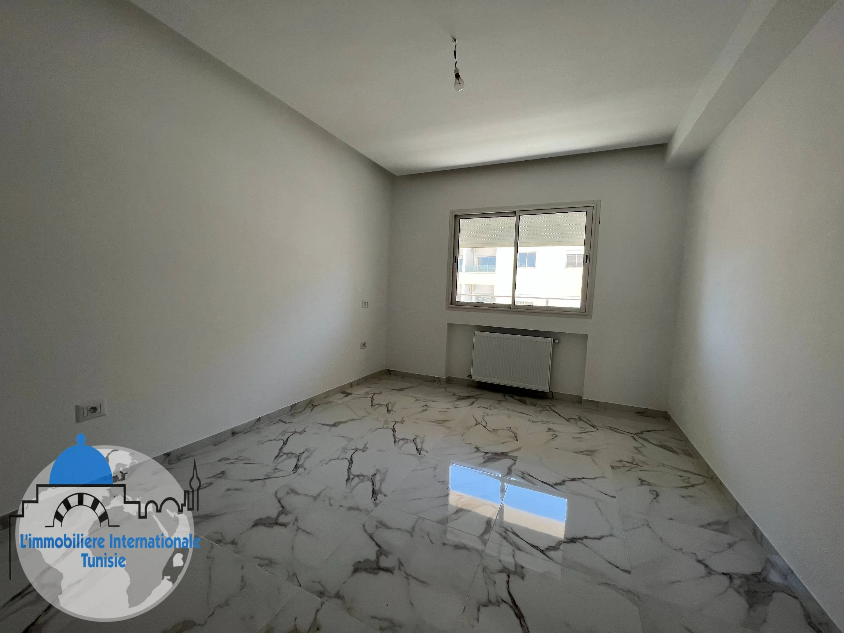 A vendre un appartement S+3 d'une superficie de 140 m²  à Sahloul 4 Sousse