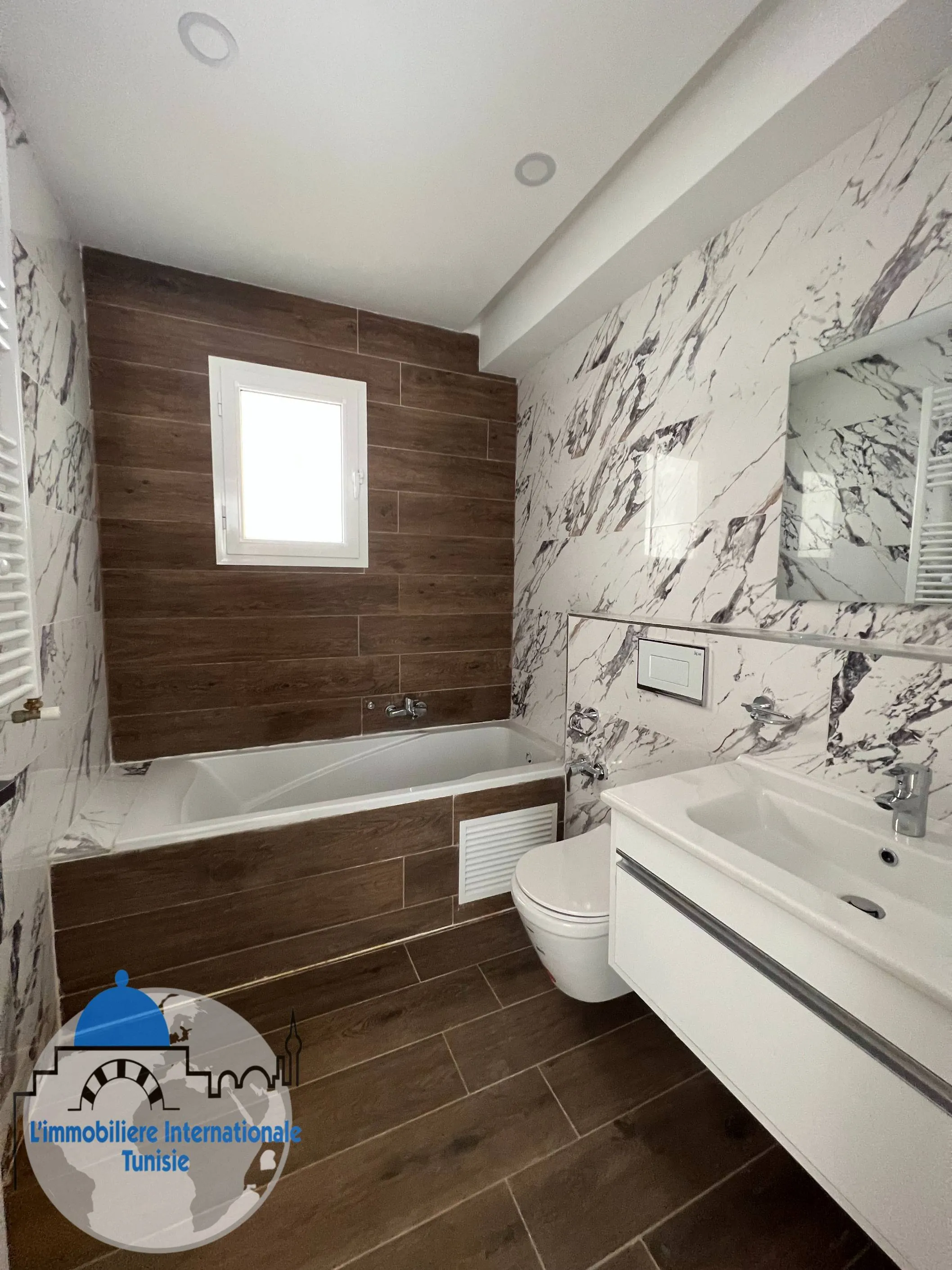 A vendre un appartement S+3 d'une superficie de 140 m²  à Sahloul 4 Sousse