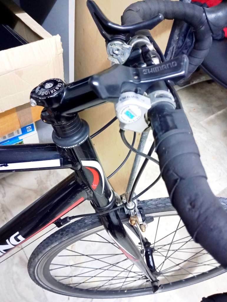 Vélo de course taille L roue 28 pousse 