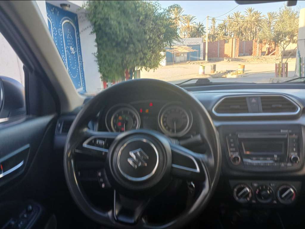 SUZUKI DZIRE ESSENCE TEL 40884251