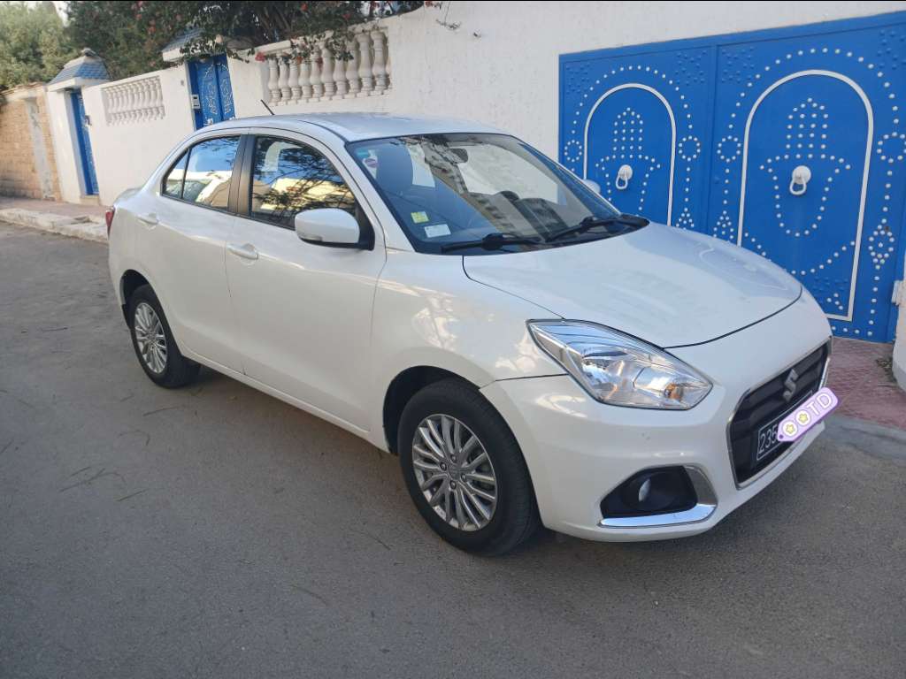 SUZUKI DZIRE ESSENCE TEL 40884251
