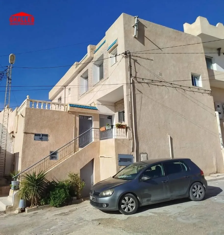 Une maison s+3 et un studio s+1 