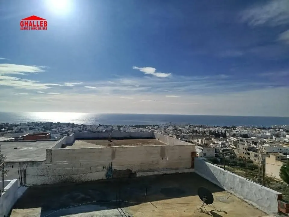 Une maison s+3 et un studio s+1 