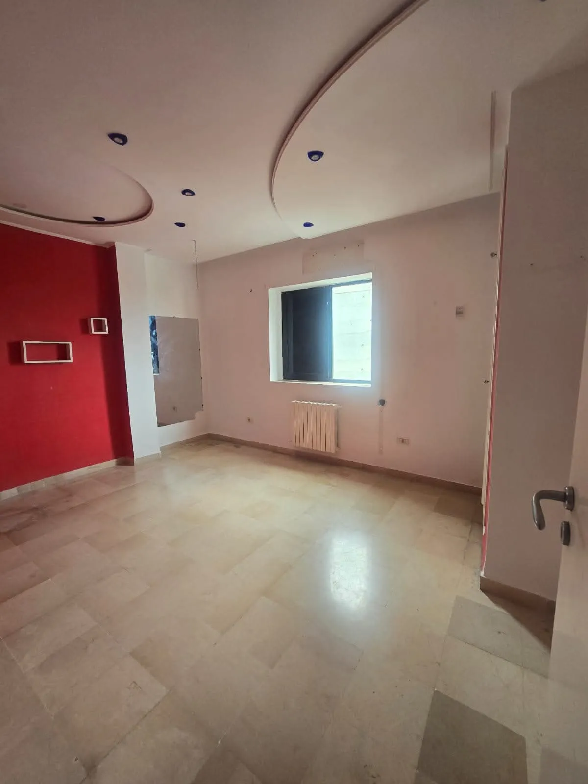 Appartement S+2 de 112m² avec place de parking privé au sous-sol
