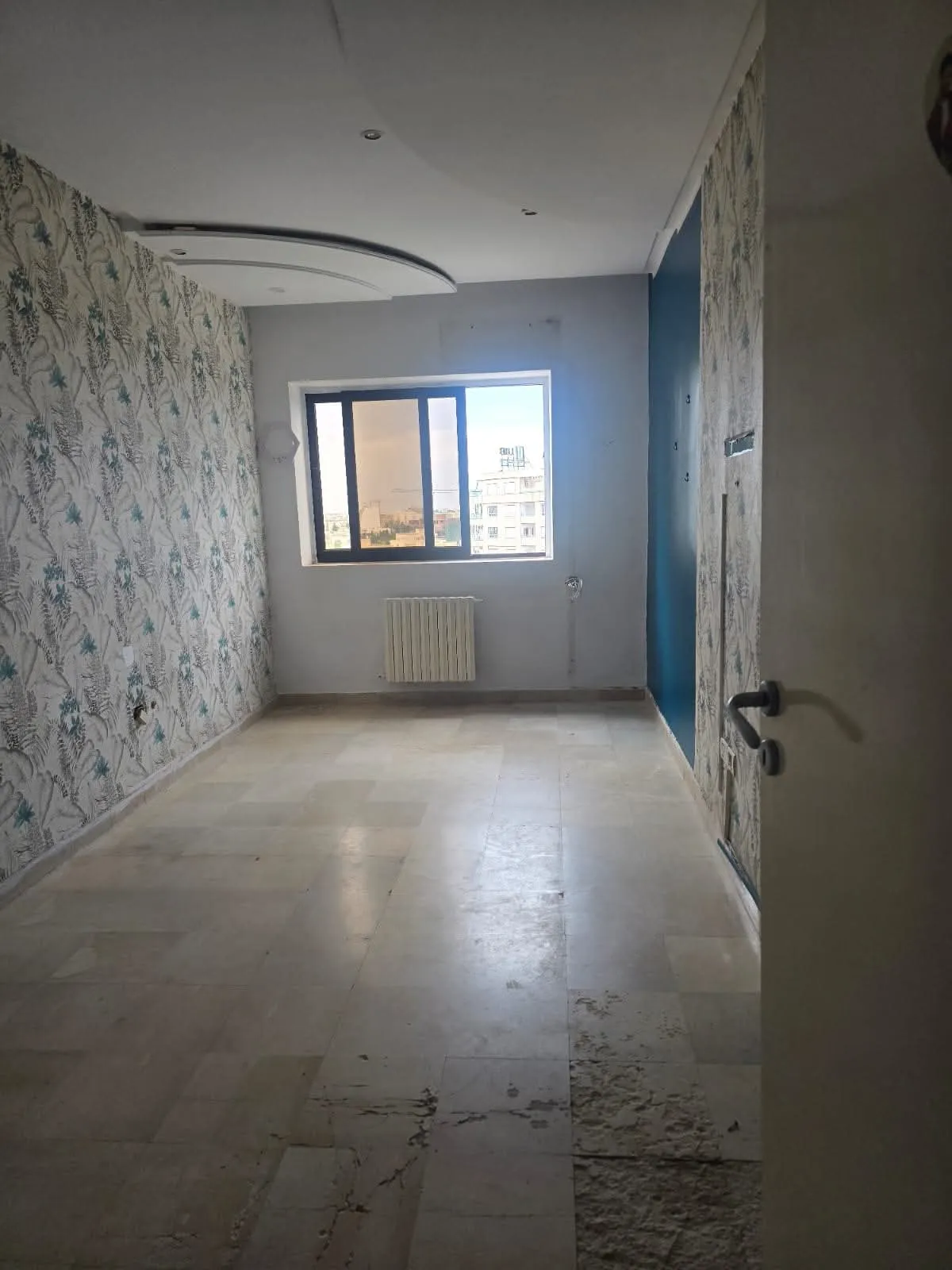 Appartement S+2 de 112m² avec place de parking privé au sous-sol