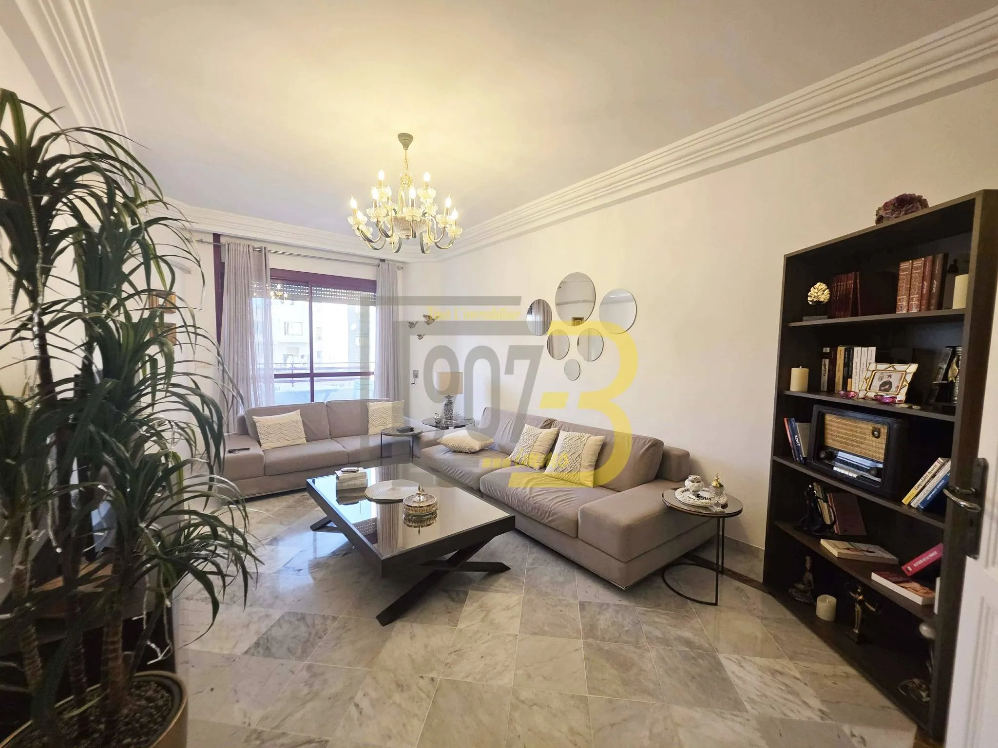 A vendre un appartement s+3 retapé à  cité Ennasr