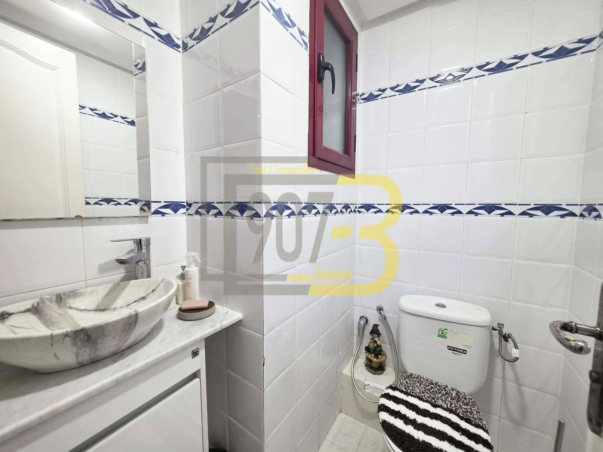 A vendre un appartement s+3 retapé à  cité Ennasr