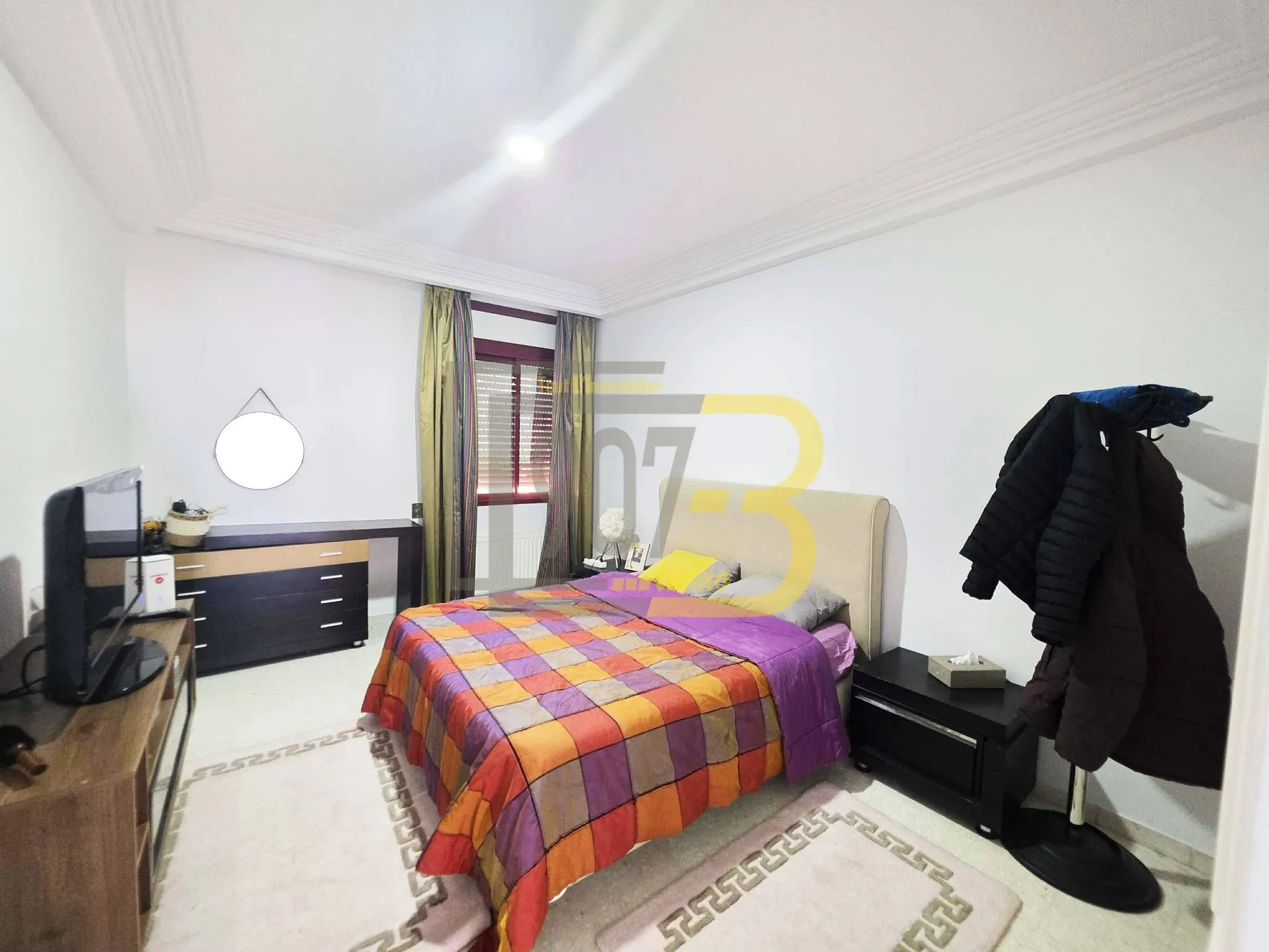 A vendre un appartement s+3 retapé à  cité Ennasr