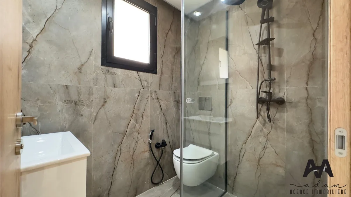 Appartement S+2 – 107 m² + Jardin 87 m² – Manzah 9C, Tunis