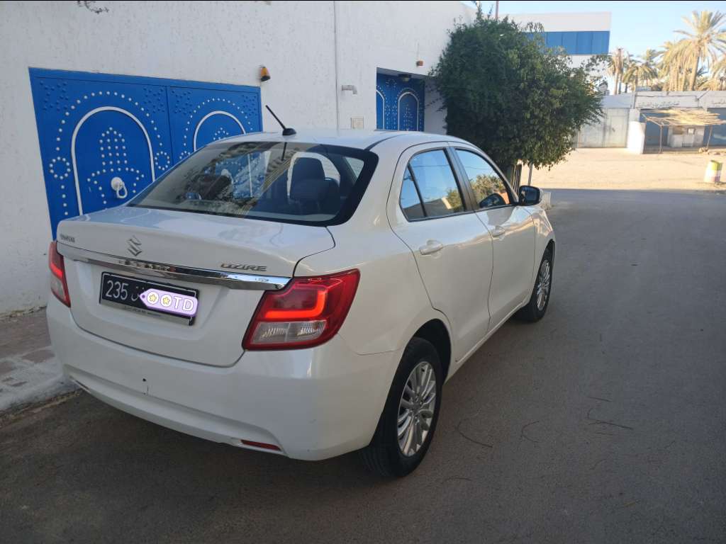 SUZUKI DZIRE ESSENCE TEL 40884251 