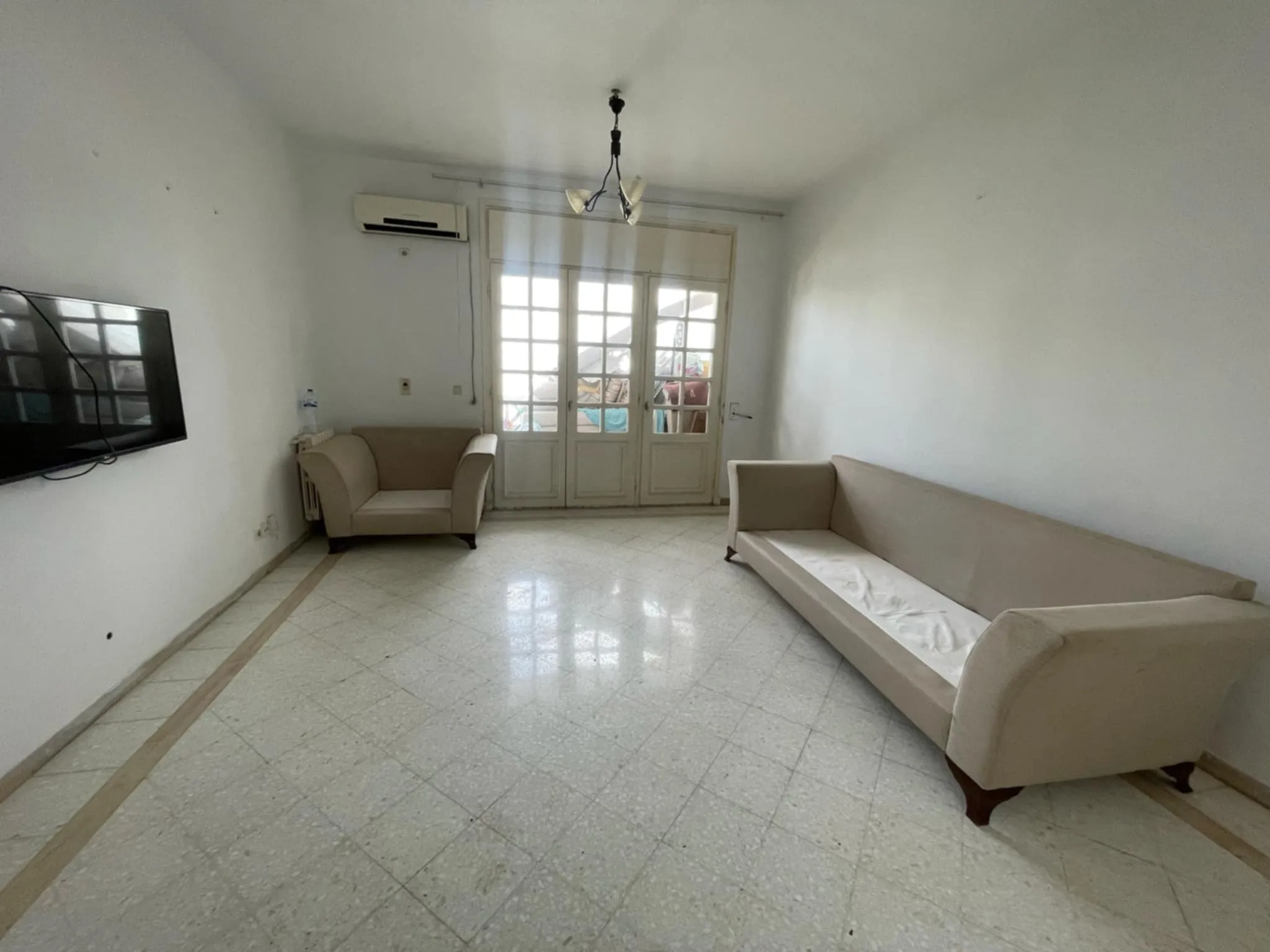 A vendre un appartement S+2 - Cité Ennasr 1