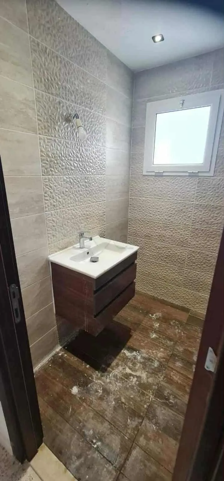 un spacieux appartements s+3 vide au rdc a louer situé a Manar 1 En Face Ecole Hannibal