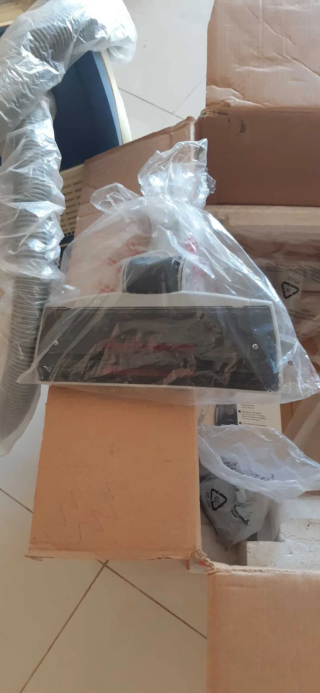 Tapis artisanal + aspirateur