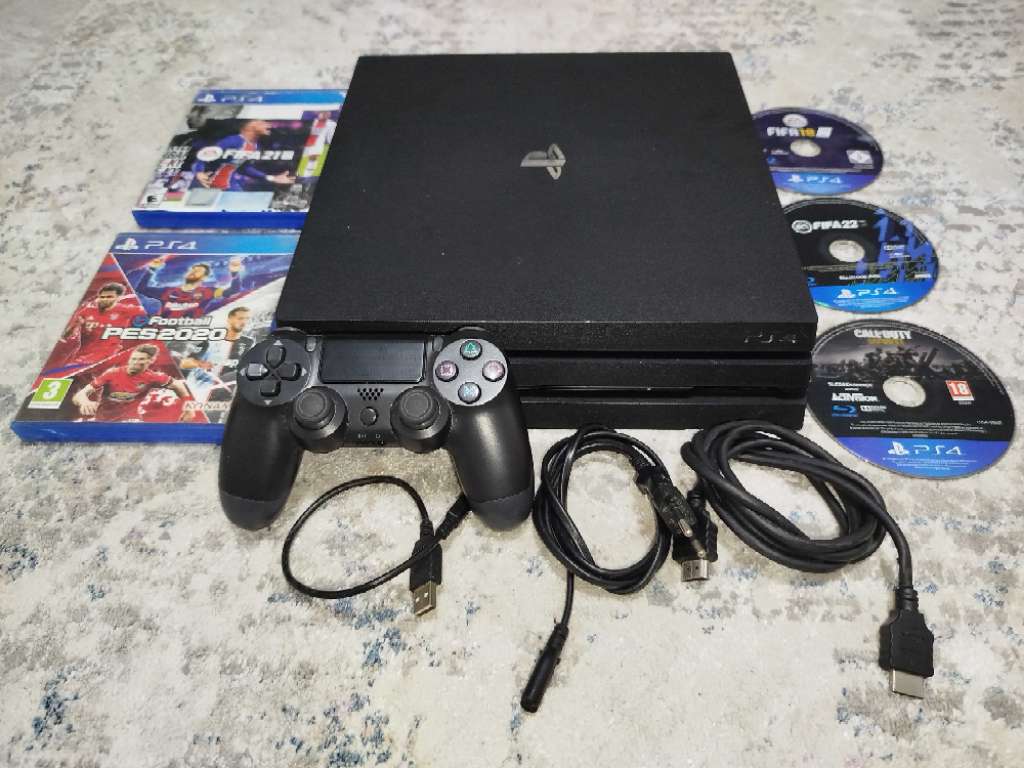 Ps4 pro + 5 cd