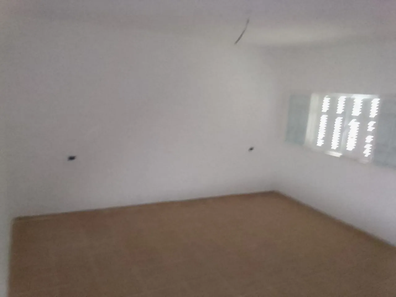 أرض 310م مع منزل60م يبتعد 700م على الطريق