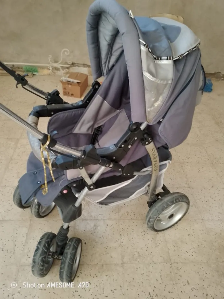 A vendre poussette en bon état