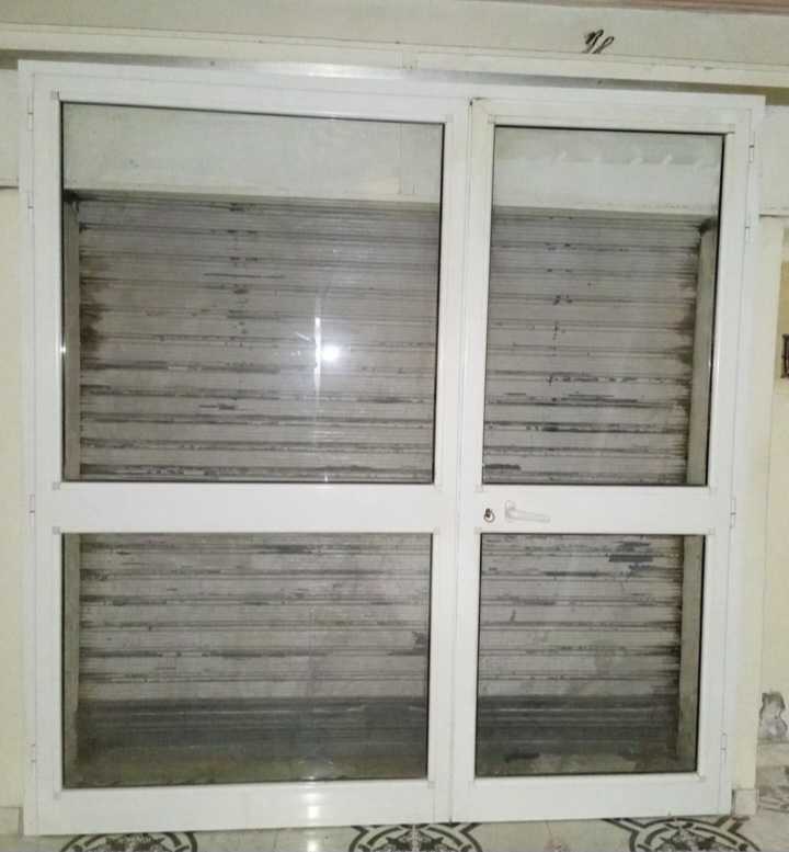 Porte aluminium TPR en bonne état 2.20/2.20
