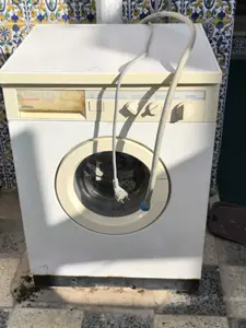 Donne machine a laver a reparer 