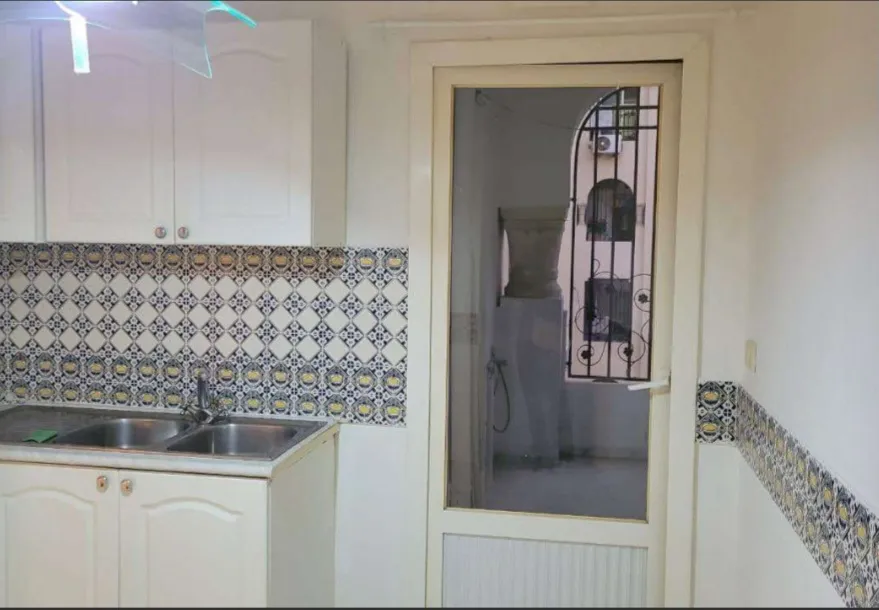 Location S2 vide à Cité Les Palmiers 