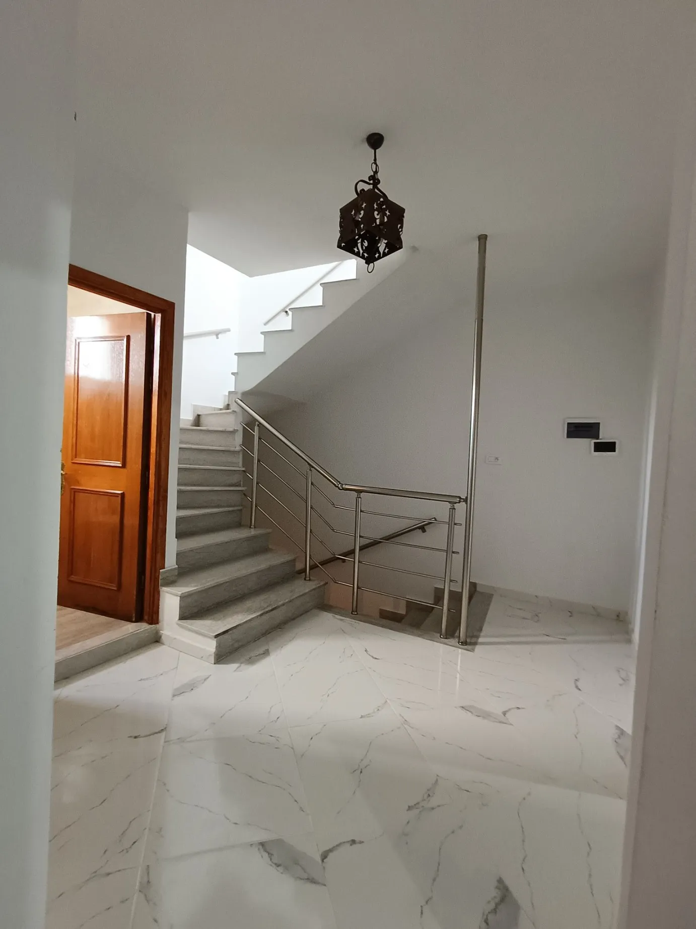 A vendre une maison de style américain s+3 au centre ville elhaouaria