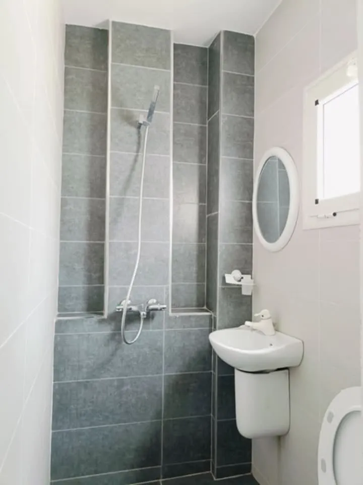 A vendre une maison de style américain s+3 au centre ville elhaouaria