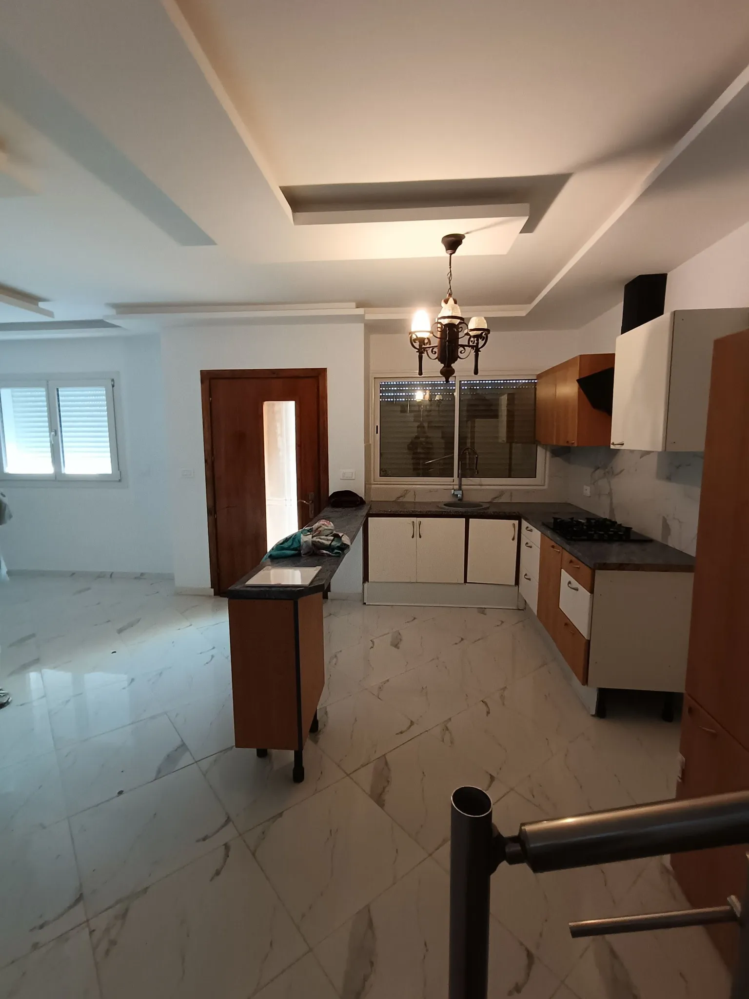 A vendre une maison de style américain s+3 au centre ville elhaouaria