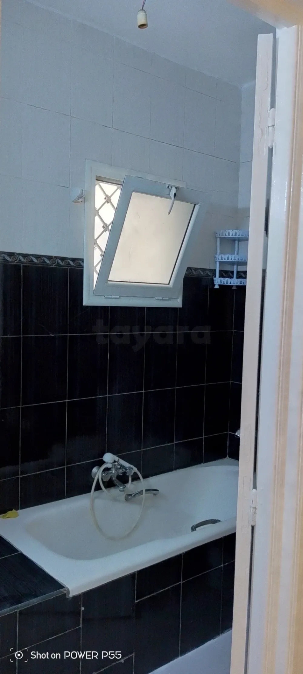 un appartement s+2 au rdc a louer situé a jardin d'el manzah 1 prés de x3(cité banafssej)
