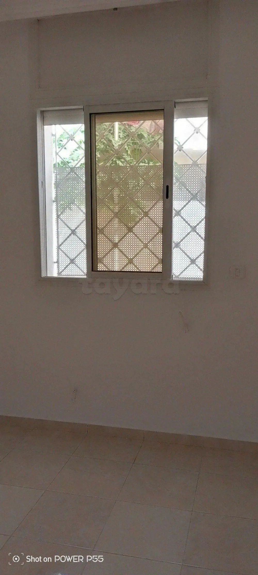 un appartement s+2 au rdc a louer situé a jardin d'el manzah 1 prés de x3(cité banafssej)