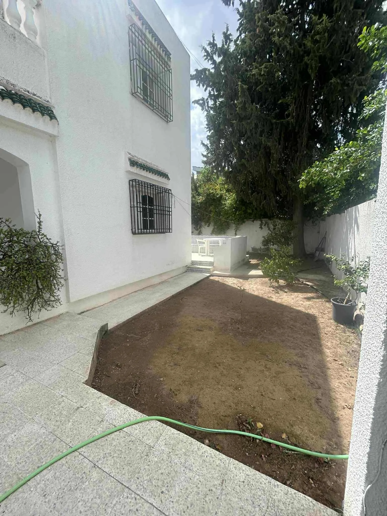 AV Villa terrain 900m² la Soukra